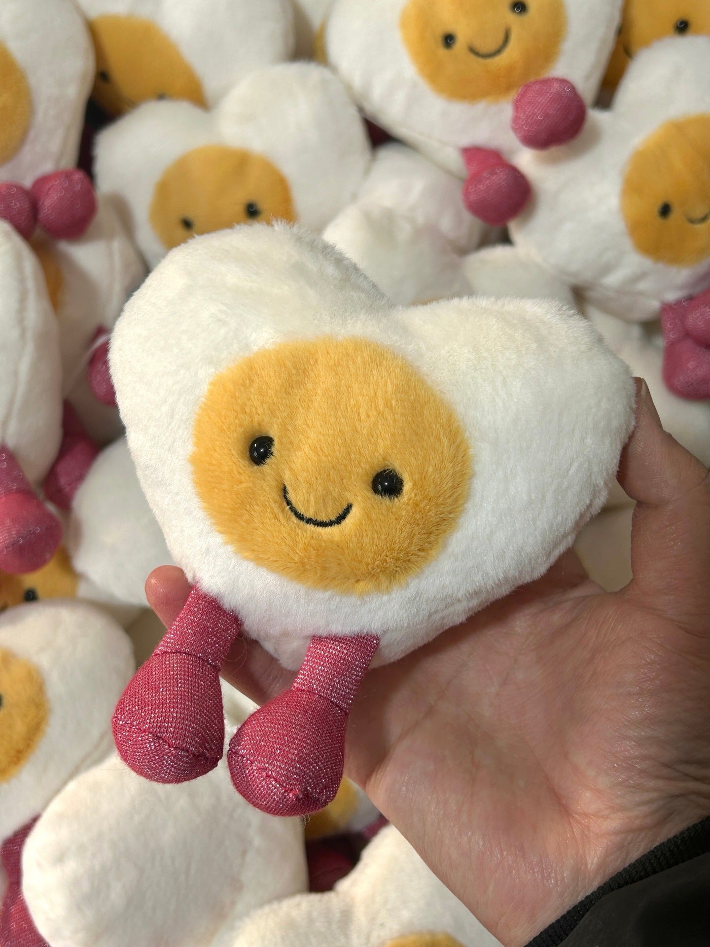Jellycat plush toys with complete labels, including the Sun, Barcelona Bear cub, and Flying Dragon plush toys, available for wholesale as gifts