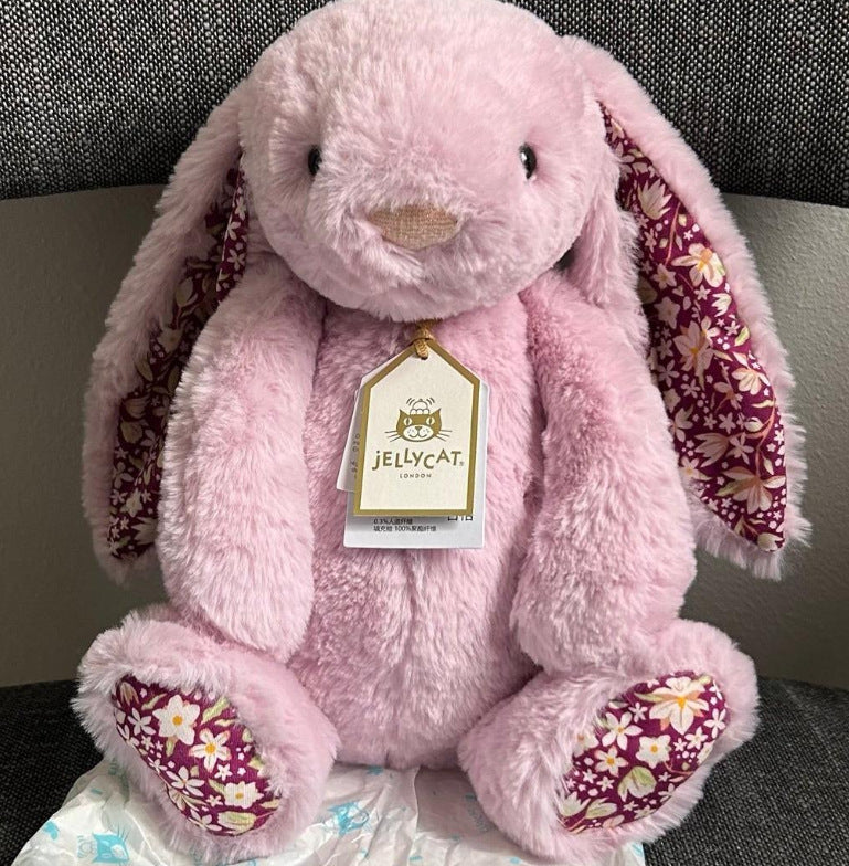 Jellycat plush toys with complete labels, including the Sun, Barcelona Bear cub, and Flying Dragon plush toys, available for wholesale as gifts