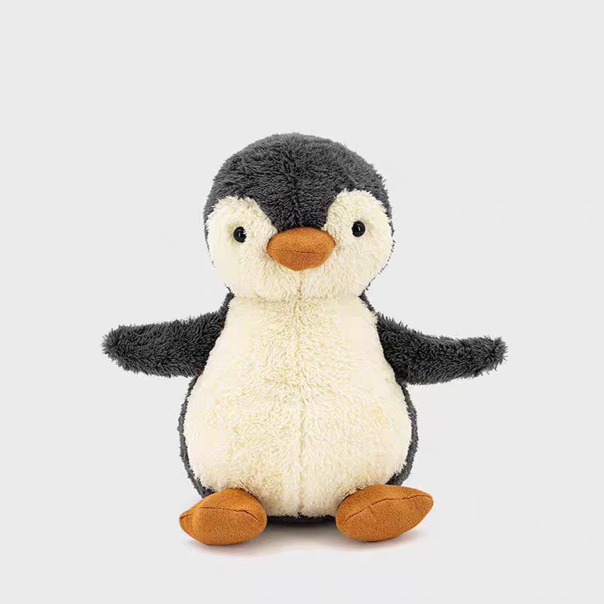 Jellycat plush toys with complete labels, including the Sun, Barcelona Bear cub, and Flying Dragon plush toys, available for wholesale as gifts