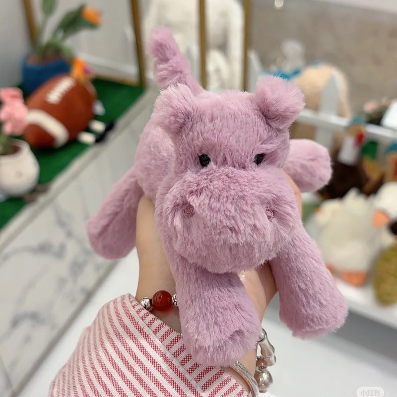 Jellycat plush toys with complete labels, including the Sun, Barcelona Bear cub, and Flying Dragon plush toys, available for wholesale as gifts