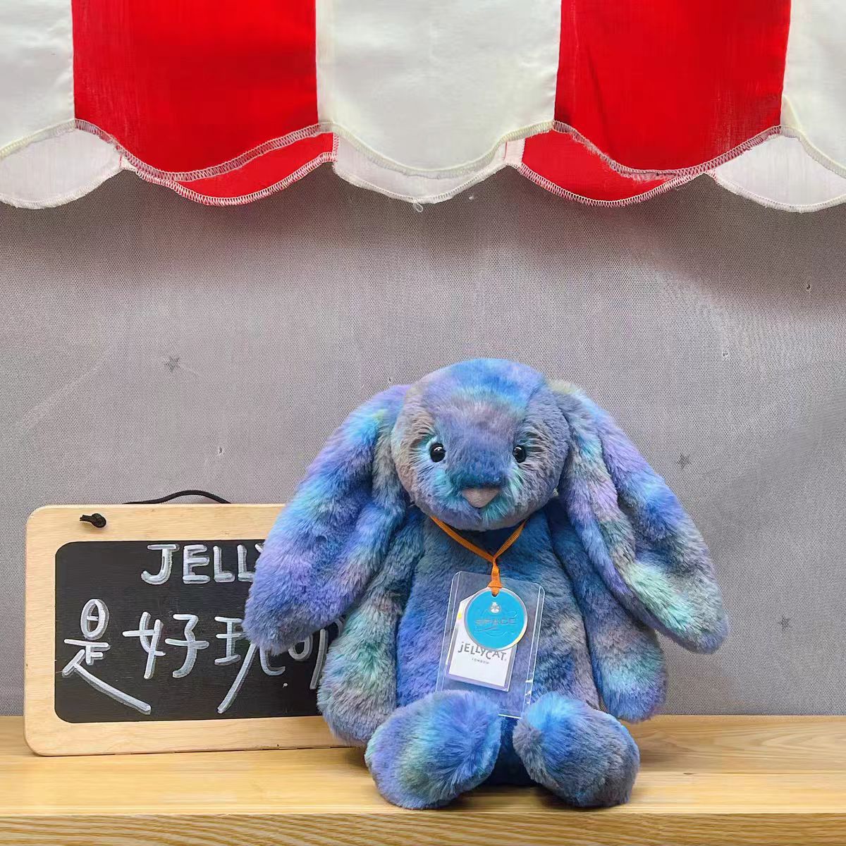 Jellycat plush toys with complete labels, including the Sun, Barcelona Bear cub, and Flying Dragon plush toys, available for wholesale as gifts