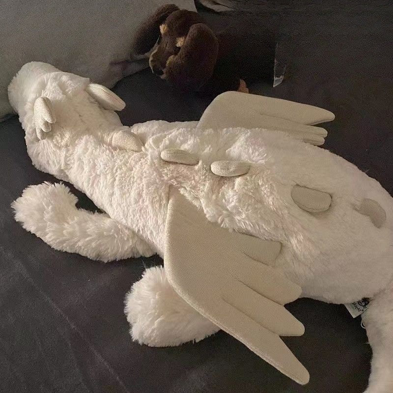 Jellycat plush toys with complete labels, including the Sun, Barcelona Bear cub, and Flying Dragon plush toys, available for wholesale as gifts
