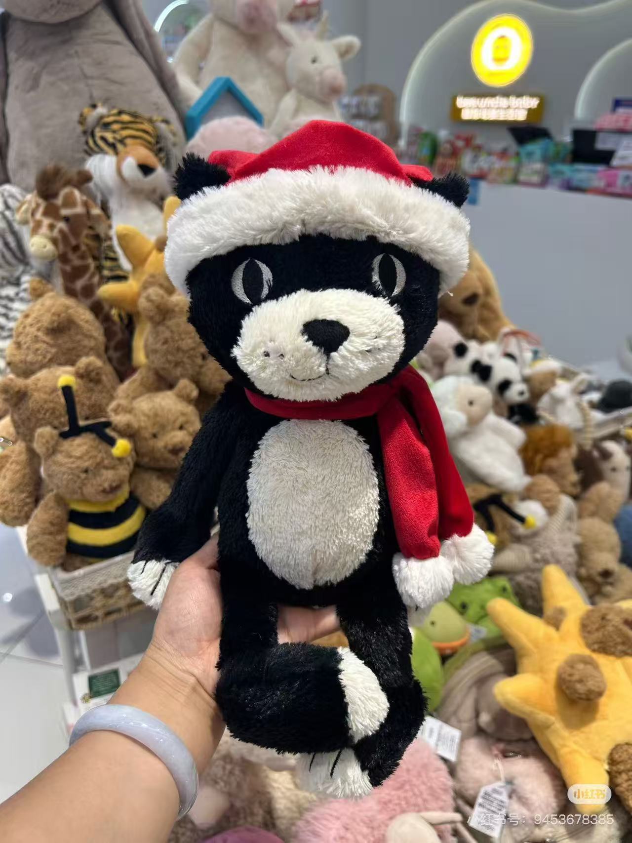 Jellycat plush toys with complete labels, including the Sun, Barcelona Bear cub, and Flying Dragon plush toys, available for wholesale as gifts