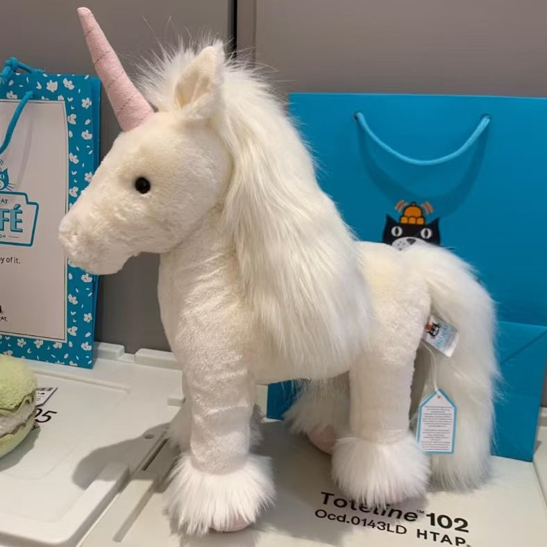 Jellycat plush toys with complete labels, including the Sun, Barcelona Bear cub, and Flying Dragon plush toys, available for wholesale as gifts